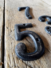 Small Iron Numbers